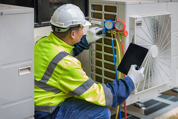 Professional Hvac technician working in Manchester, VA